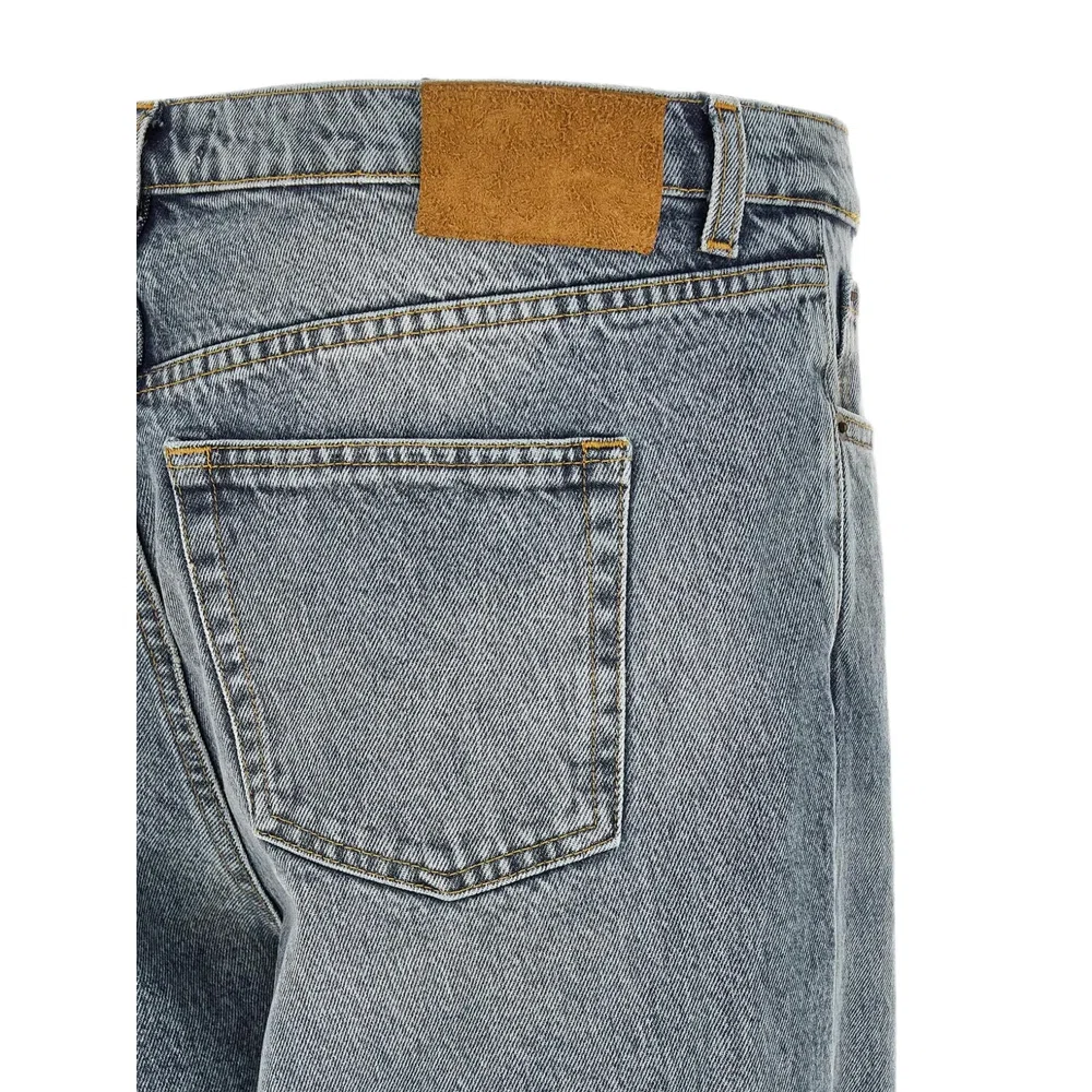 Джинсы с эффектом stonewash и зауженными к низу штанинами 4