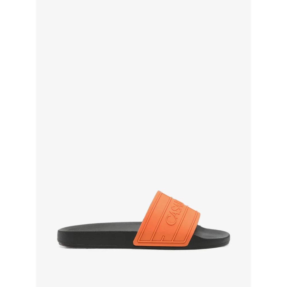 Шлепанцы с тисненым логотипом 1