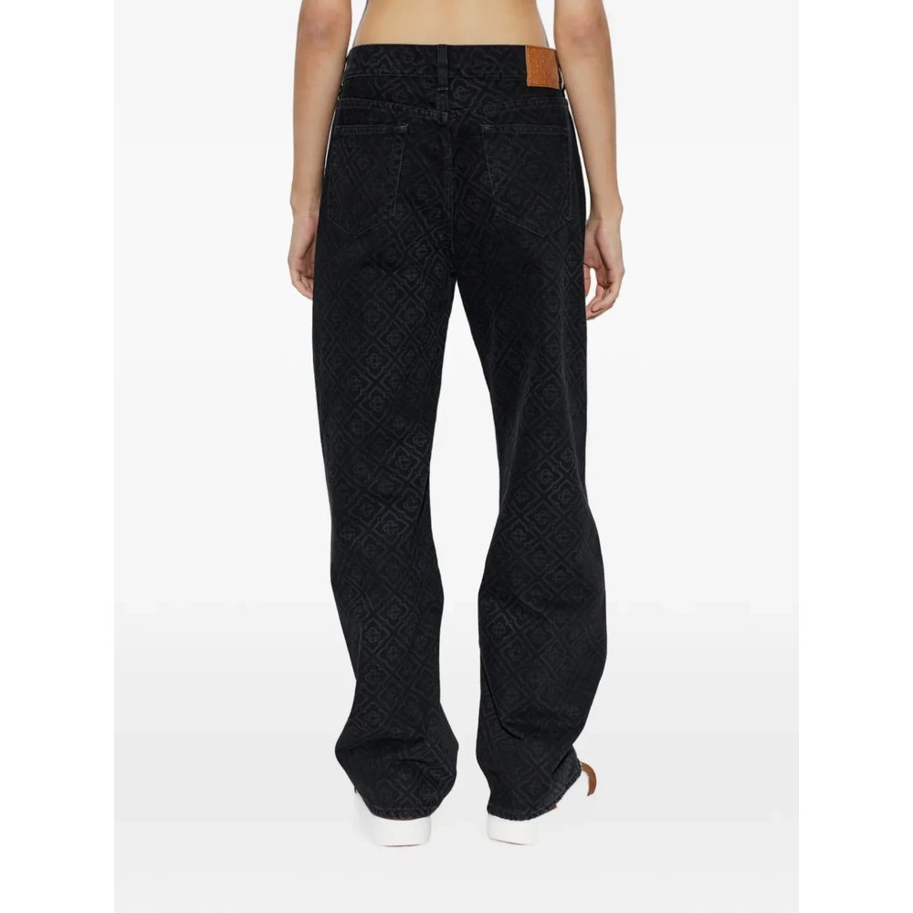 Джинсы с монограммой 4
